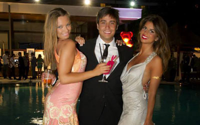 Guests wearing DeLafée's gold tattoos